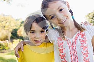 Portrait of brother and sister posing for the camera