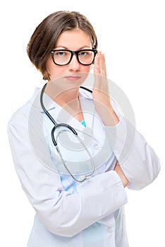 Portrait of a brunette doctor in glasses