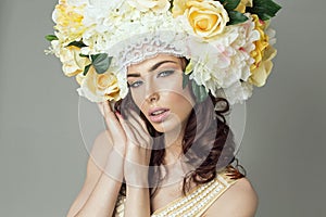 Portrait of brunette with floral headpiece photo