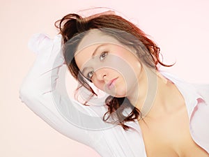 Portrait of brunette girl long hair on pink