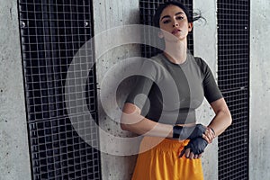 Portrait of a brunette lady preparing to training