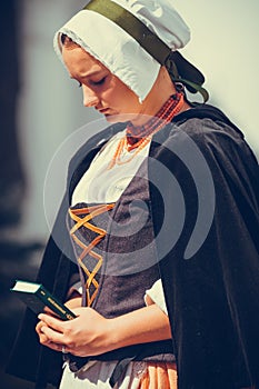 Portrait of brunette woman dressed in historical Baroque clothes