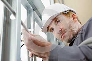 Portrait builder carrying out home improvements