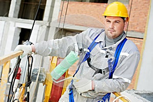 Portrait of builder facade painter at work