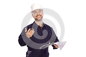 Portrait of a builder in a white helmet on a white