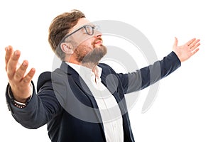 Portrait of business man with open arms and eyes closed