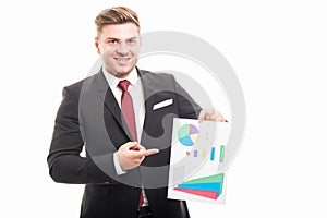 Portrait of business man pointing chart graphic