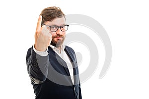 Portrait of business man showing number one with finger