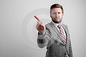 Portrait of business man wearing business clothes showing denial gesture