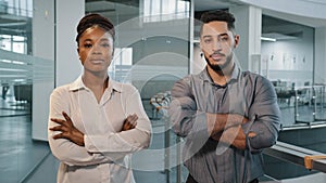 Portrait business people African lady businesswoman and adult Arabian man boss manager standing in office and posing for