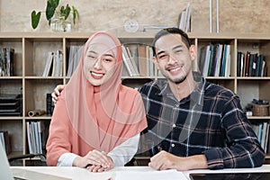Portrait of business startup persons, Islamic couple in small office