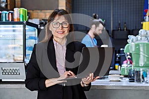 Portrait of business woman, accountant, lawyer, coffee shop cafeteria restaurant owner