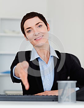 Portrait of a business woman giving her hand