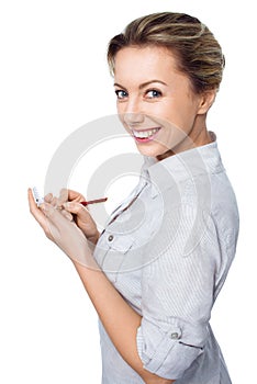 Portrait of business woman with a notepad