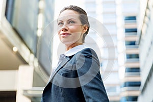 Portrait of business woman smiling outdoor