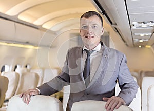 Portrait of businessman on an airplane, Passenger Relaxing