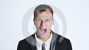Portrait of businessman in anger screaming