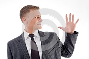 Portrait of businessman counting fingers