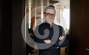 Portrait of businessman - happy man in office