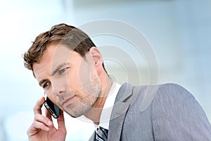 Portrait of businessman having a phonecall