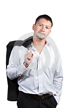 Portrait of a businessman holding his jacket over shoulder