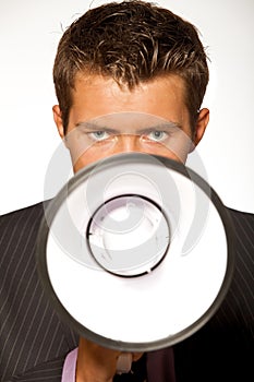Portrait of businessman with megaphone