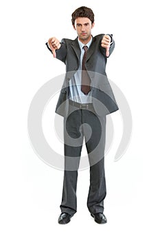 Portrait of businessman showing thumbs down