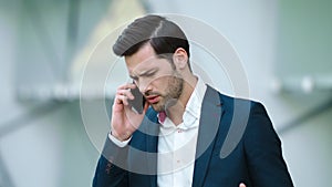 Portrait businessman talking smartphone. Man having business phone talk
