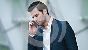 Portrait businessman talking smartphone. Man having business phone talk