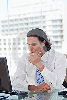 Portrait of a businessman thinking