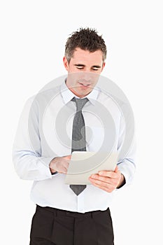 Portrait of a businessman using a tablet computer