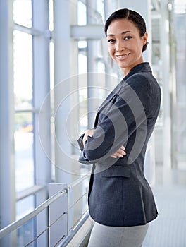 Portrait of businesswoman, arms crossed or finance career in office for professional job or corporate company. Face