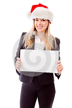 Portrait of a businesswoman holding a blank placard photo