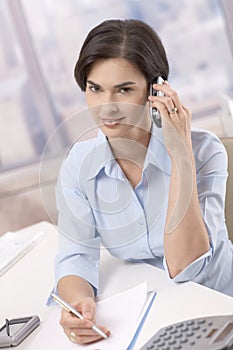 Portrait of businesswoman on phone call