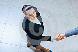 Portrait of a businesswoman shaking hand