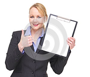 Portrait of a businesswoman showing empty sign clipboard with thumbs up