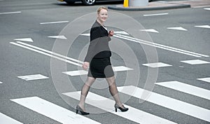 Portrait of a businesswoman walking in the city