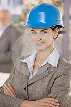 Portrait of businesswoman wearing hardhat