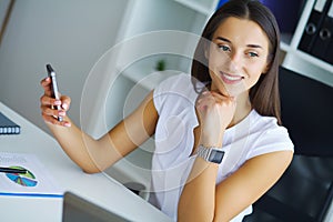 Portrait Of Businesswoman Working In Creative Office