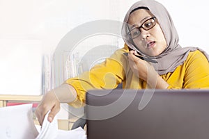 Busy Muslim Businesswoman Working in Office