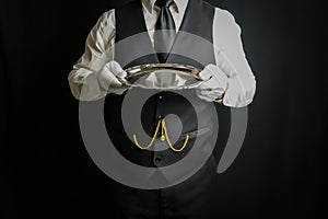 Portrait of Butler or Waiter in White Gloves Holding Silver Tray
