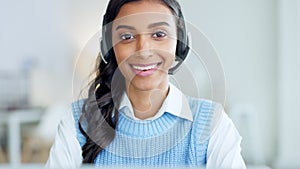 Portrait of a call center agent using a headset while consulting for customer service and sales support. Confident young