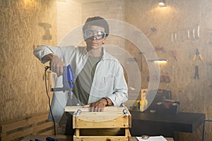 Portrait of a carpenter with safety goggles