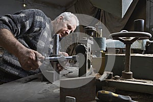 Portrait of Carpenter Working in Workshop