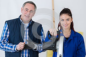 Portrait carpentry apprentice and teacher