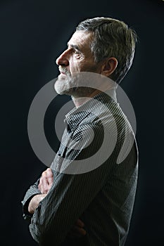 Portrait of a casual middle aged man in striped shirt