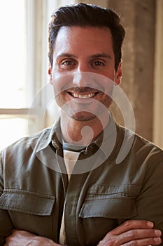 Portrait Of Casually Dressed Businessman In Office