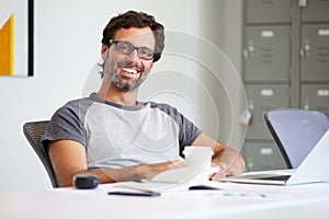 Portrait Of Casually Dressed Man Working In Design Studio