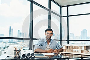 Architect engineer drawing blueprint with project plan. Front view. Tracery