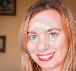 Portrait of a Caucasian Blond Woman Smiling